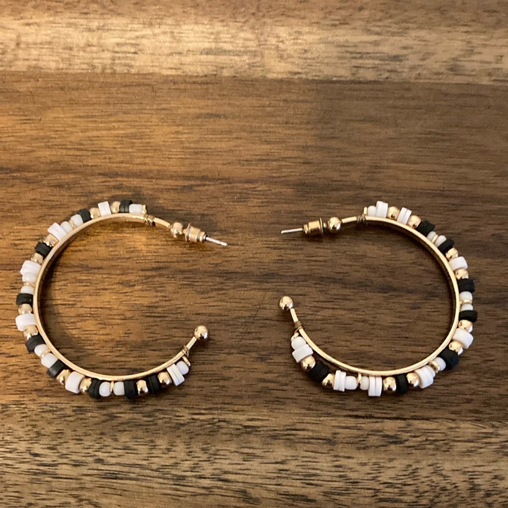 Black and white beaded hoop earrings